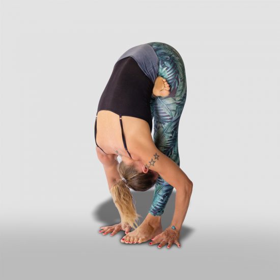 demonstration of Half lotus forward fold, Ardha Baddha Padmottanasana in sanskrit