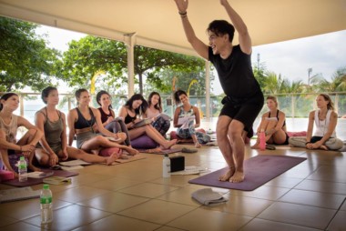 diaz's demonstration of utkatasana cues at the creative vinyasa workshop during a YTT