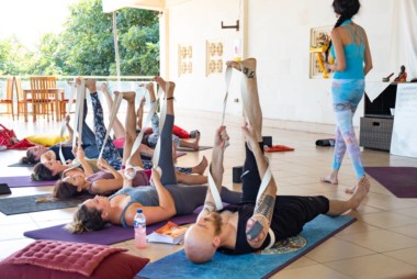 supta padangusthasana practice with straps